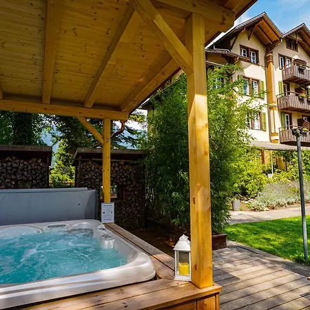 Отель Alpenrose And Gardens